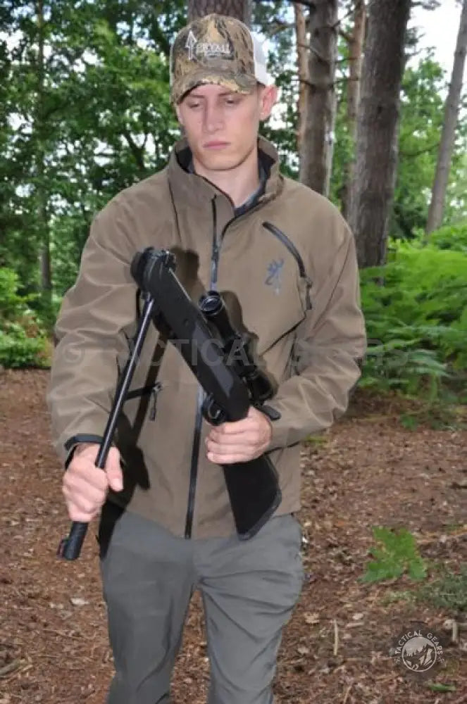 Man in hunting attire holding LB-600 Air Rifle 5.5mm with trigger blade and factory set