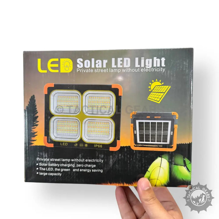 Black and Yellow Solar Flood Light with four LED panels and solar charging panel