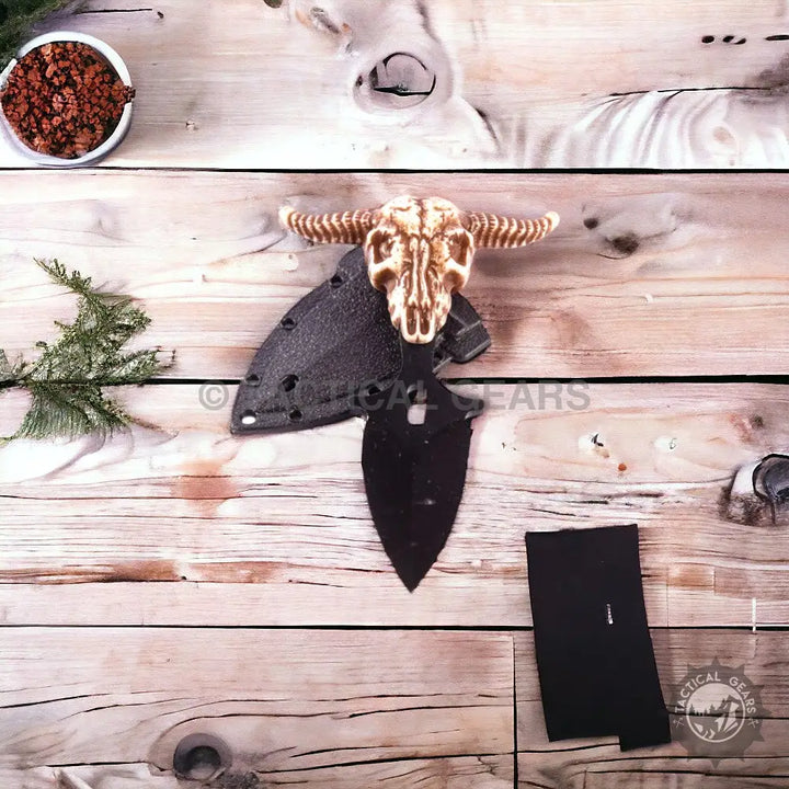 Skythia Death Call Push Knife with realistic bull skull carving and black sheath