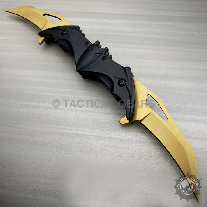 Dark Knight Spring Assisted Dual Batman Tactical Folding Knife with gold-bladed scorpion knife design