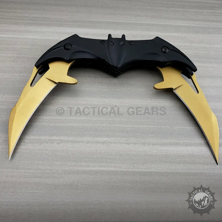 Dark Knight Spring Assisted Dual Batman Tactical Folding Knife with gold-bladed black metal scorpion knife