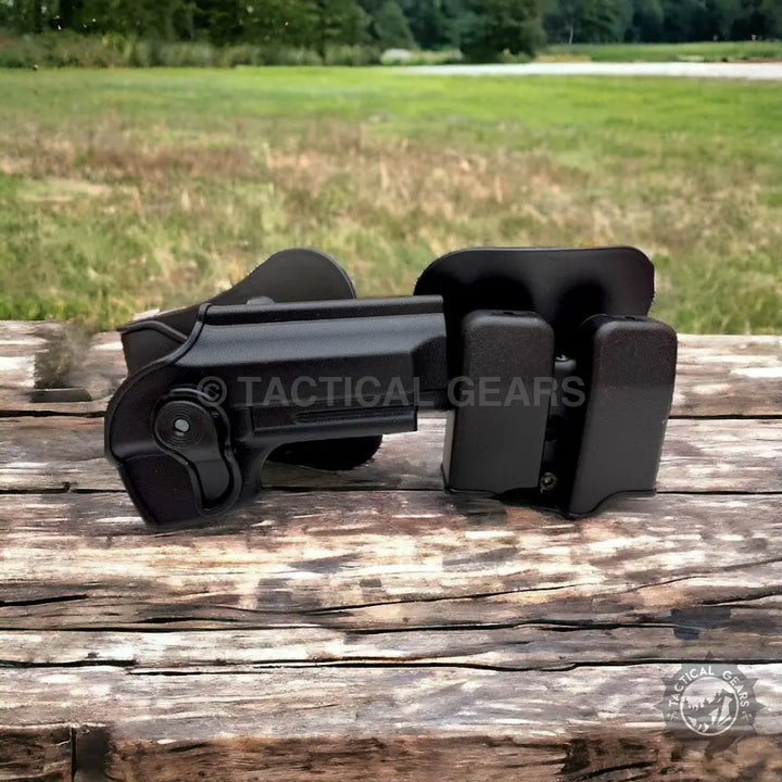 Black polymer tactical belt with mag pouch and pistol holster for Beretta pistols