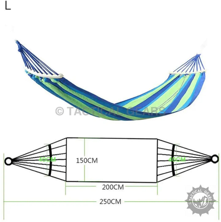Blue and green striped fabric hammock with wooden spread bars and travel bag