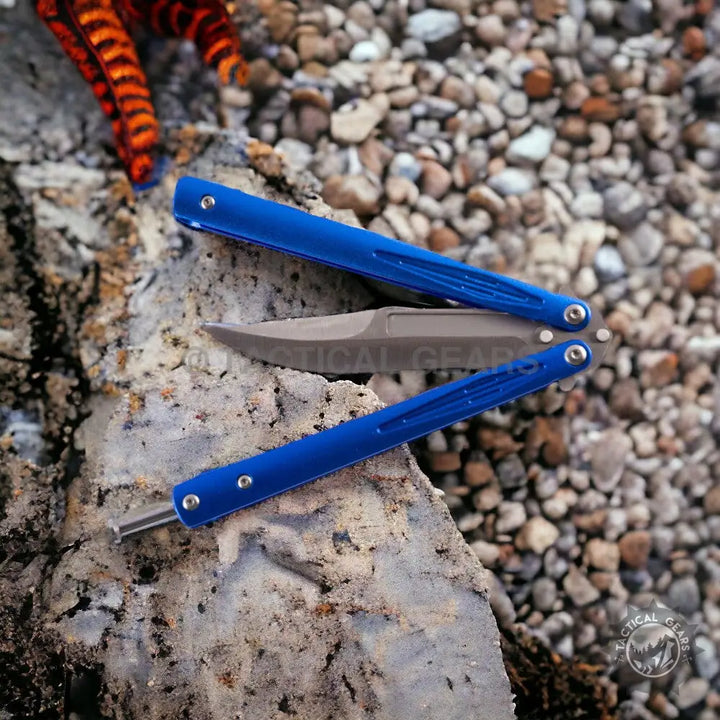Blue-handled butterfly knife with a gray blade, approximately 8 inches, ideal for collectors
