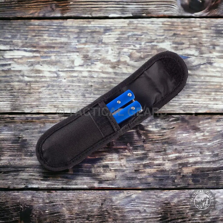 Blue butterfly knife in a black nylon sheath, approx 8 inches long, for safe carrying