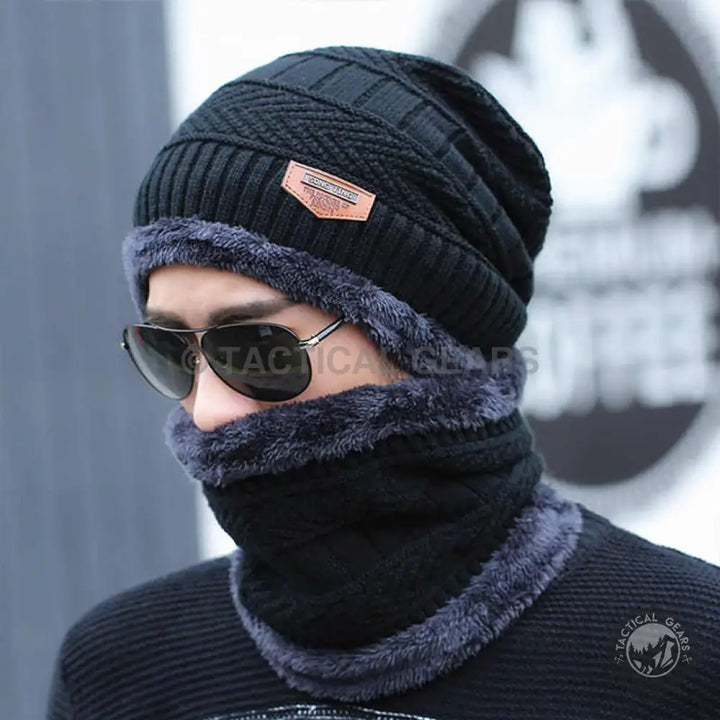 Blue knitted skullcap and neck scarf set with faux fur lining for warmth and style