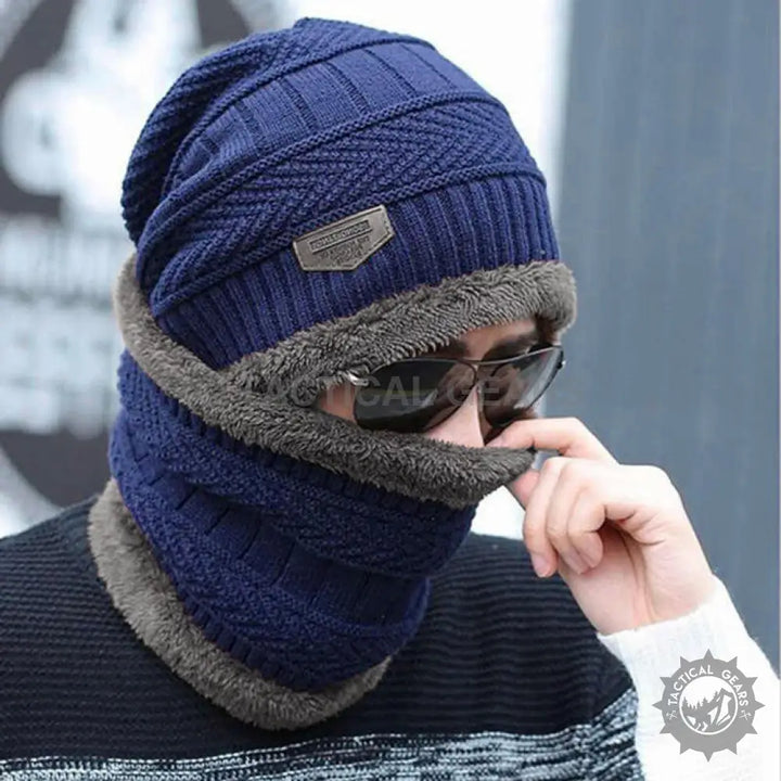 Blue knitted skullcap and neck scarf set with plush gray lining for winter warmth
