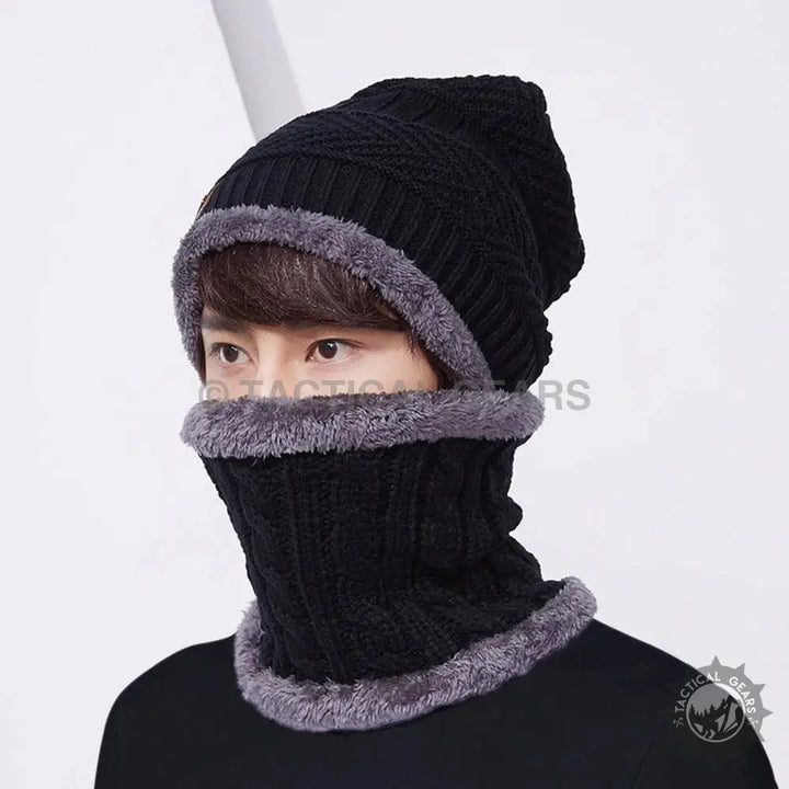 Black knitted skullcap and neck scarf set with gray fleece lining for winter warmth