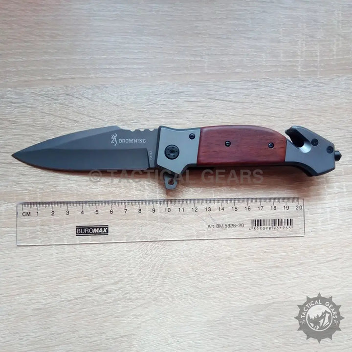 Browning DA167 folding knife with black blade and wooden handle