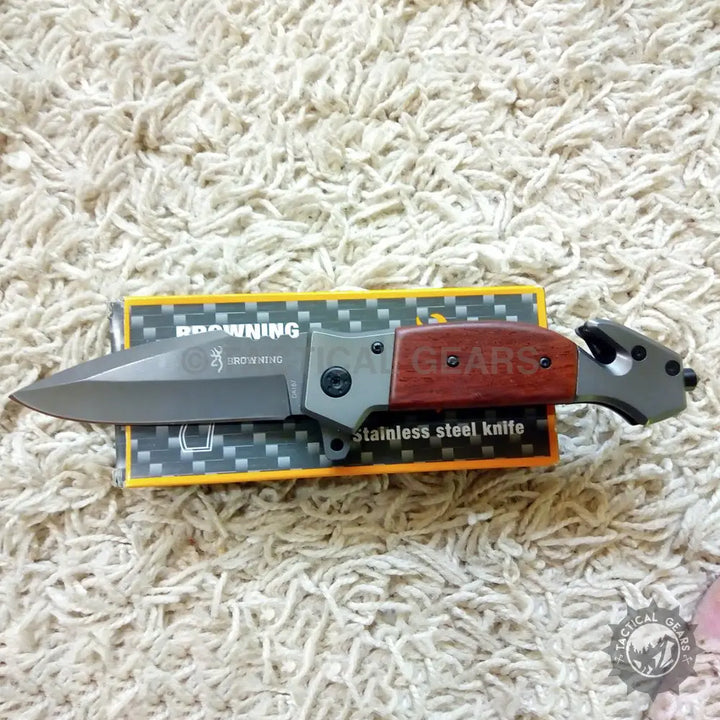 Browning DA167 folding knife with wooden handle and black stainless steel blade