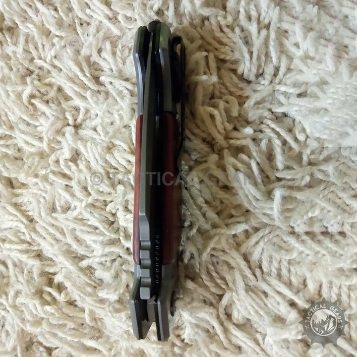 Browning DA167 wooden handle folding knife with red accents