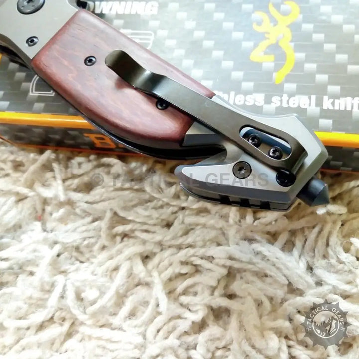 Browning DA167 folding knife with wooden handle and stainless steel blade