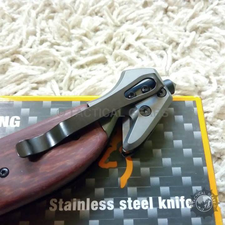 Browning DA167 wooden handle folding knife with tactical black blade tip