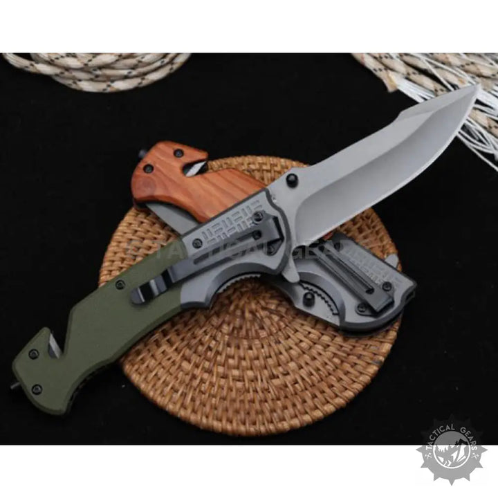 Browning DA308 tactical knife with olive green wooden handle and silver blade
