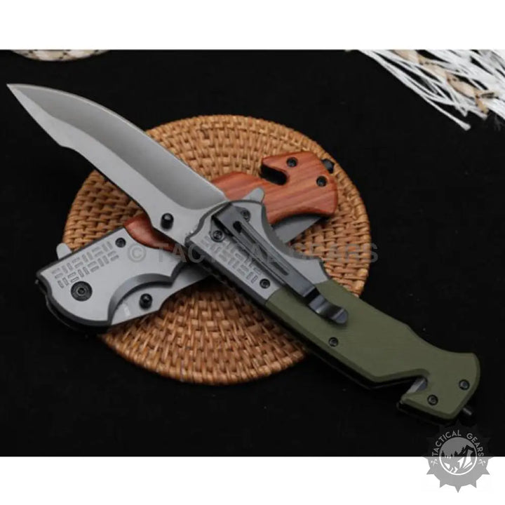 Browning DA308 tactical knife with olive green wooden handle and steel blade