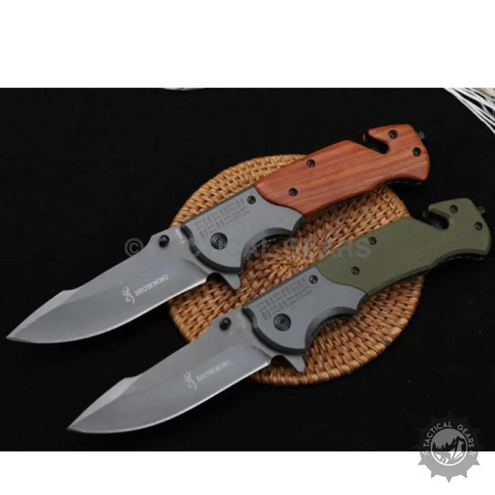 Browning DA308 Tactical Knife with wood and olive green handles, gray blades, seatbelt cutter
