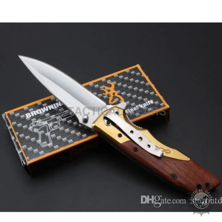 Browning DA77 titanium folding pocket knife with brown wooden handle