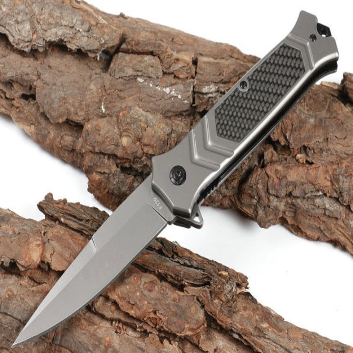 Browning F129 folding knife with 3cm silver blade and black textured handle