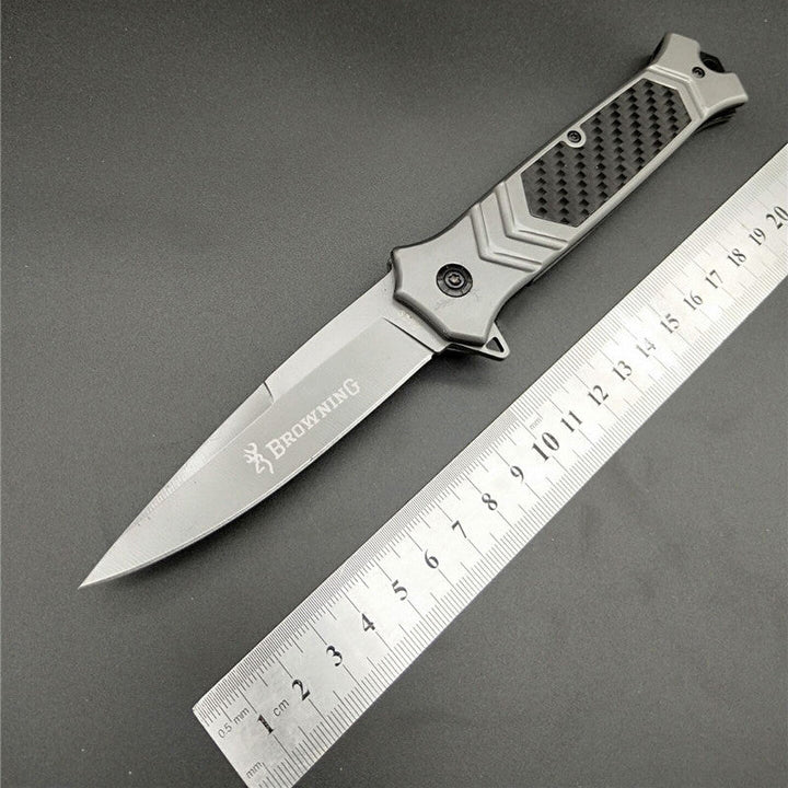 Browning F129 folding knife with 3cm silver blade and black textured handle