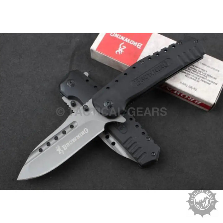 Browning F66 folding knife with black handle and silver blade