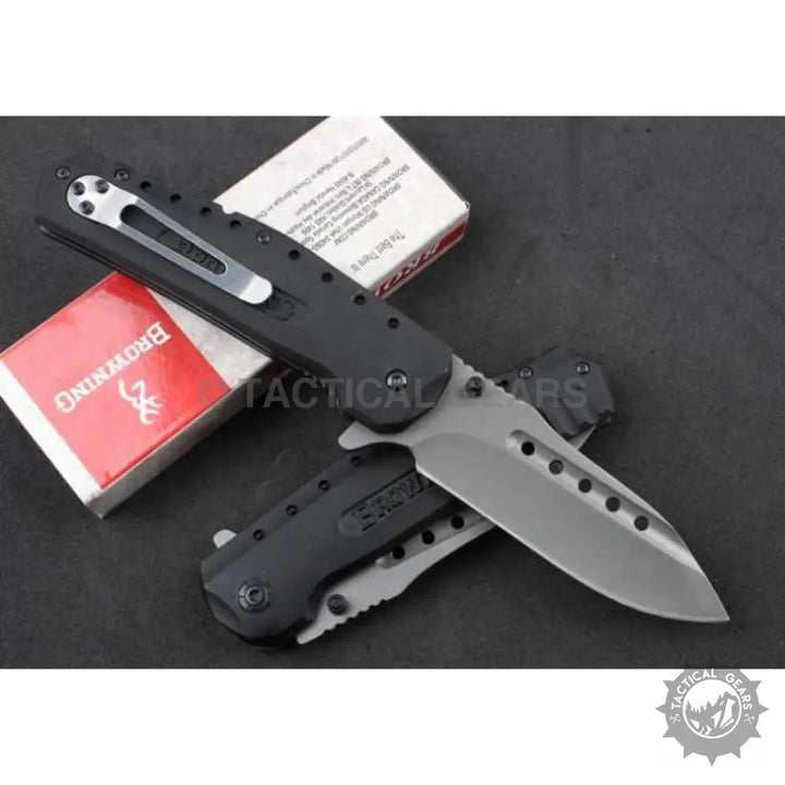 Browning F66 folding knife with black handle, grey blade, and pocket clip