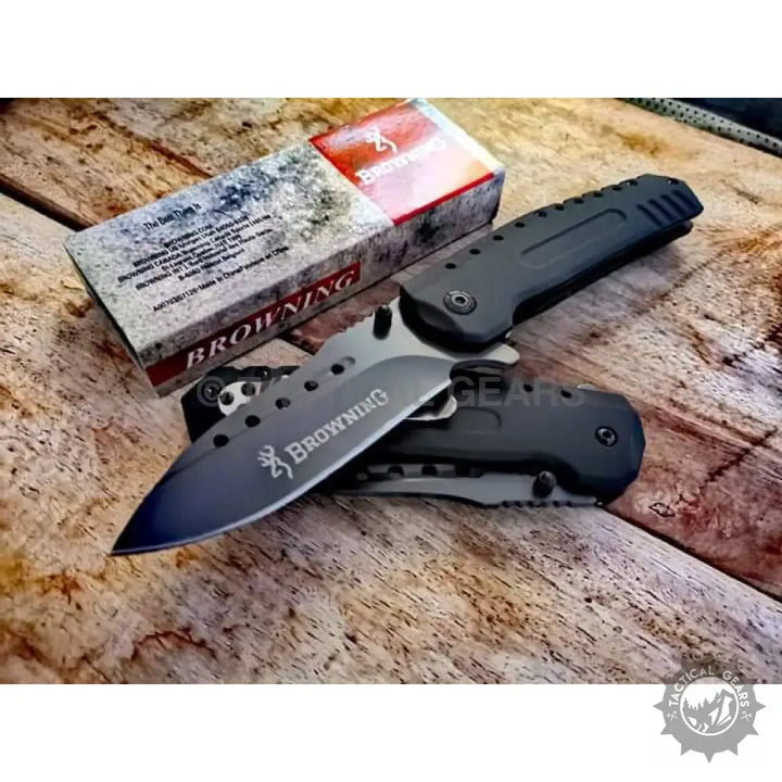 Browning F66 folding knife with black handle and textured grip