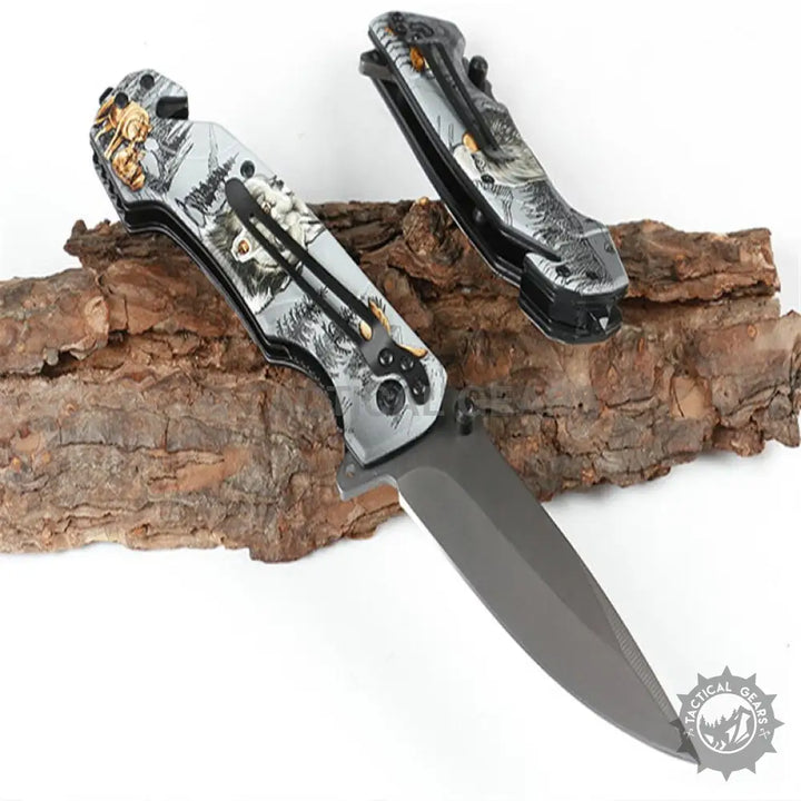 Browning FA18-1 folding knife with black silver blade and camo handle