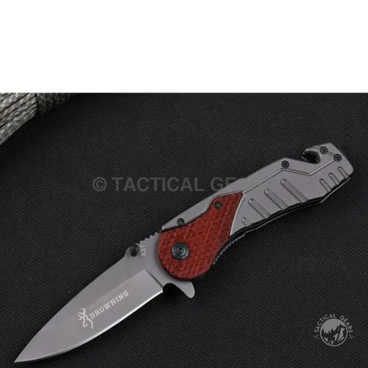 Browning X31 Knife with gray blade and handle featuring red and gray sections