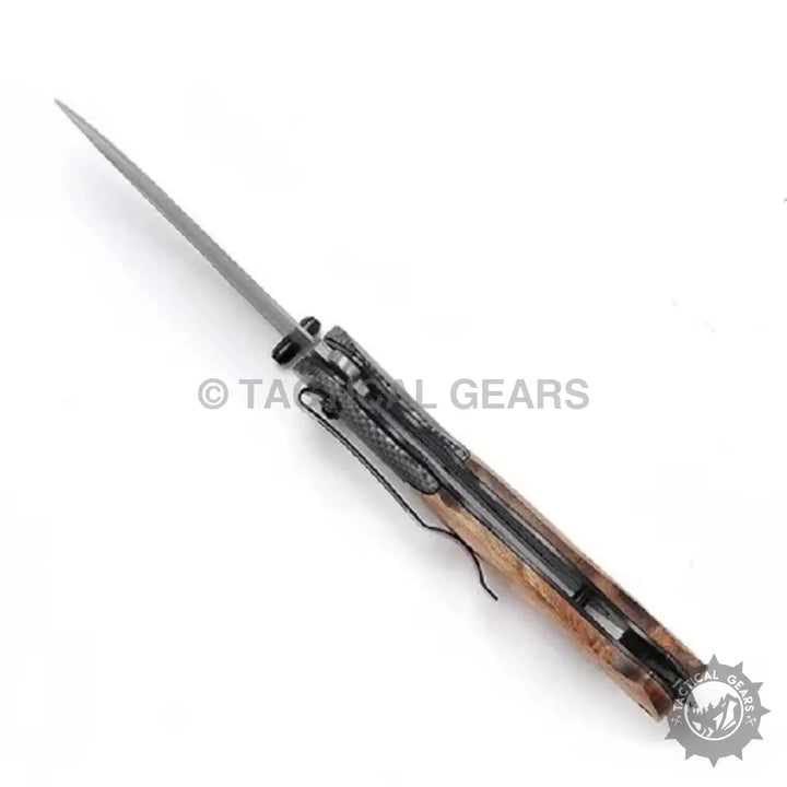 Browning X50 folding knife with slender blade and patterned handle for hunting and outdoor use