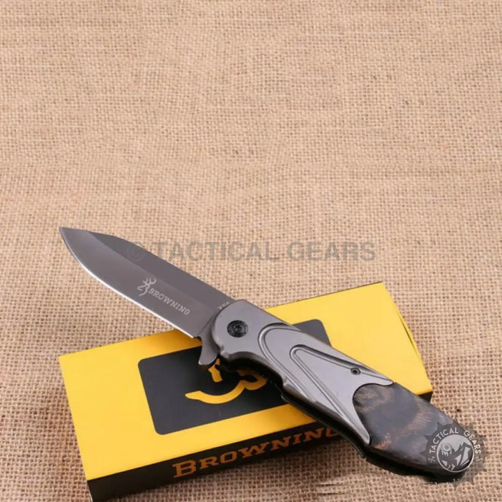 Browning X56 folding pocket knife with black 8cm blade and wood handle