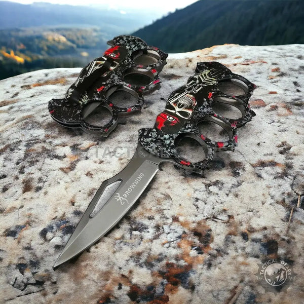 Browning X80 Travel Knife with Knuckle featuring two skull-themed duster knives