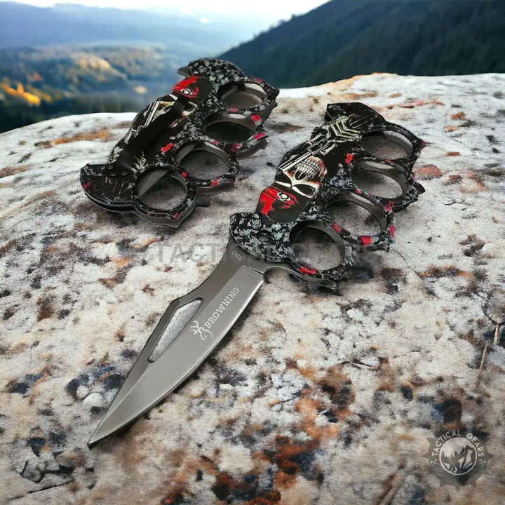 Browning X80 Travel Knife with Knuckle featuring two skull-themed duster knives