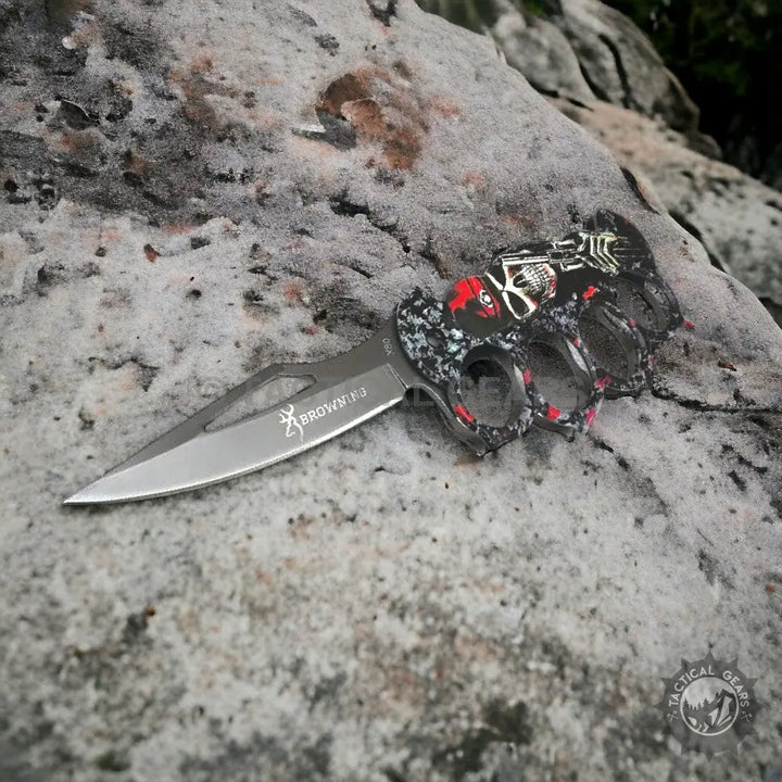 Browning X80 Travel Knuckle Knife with skull-patterned handle