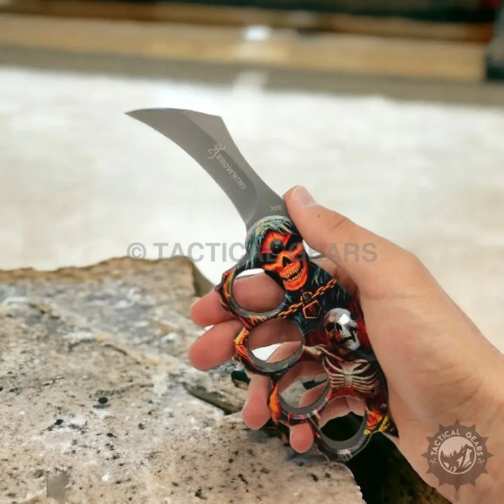 Browning x86 Travel Knife with skeleton skull handle in black and orange