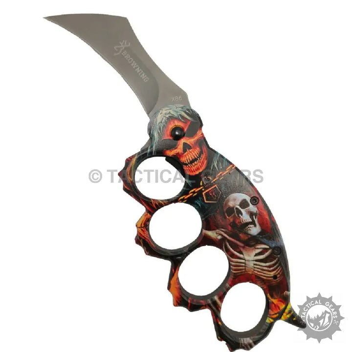 Browning x86 Travel Knife with skull-themed black handle and red skeleton accents