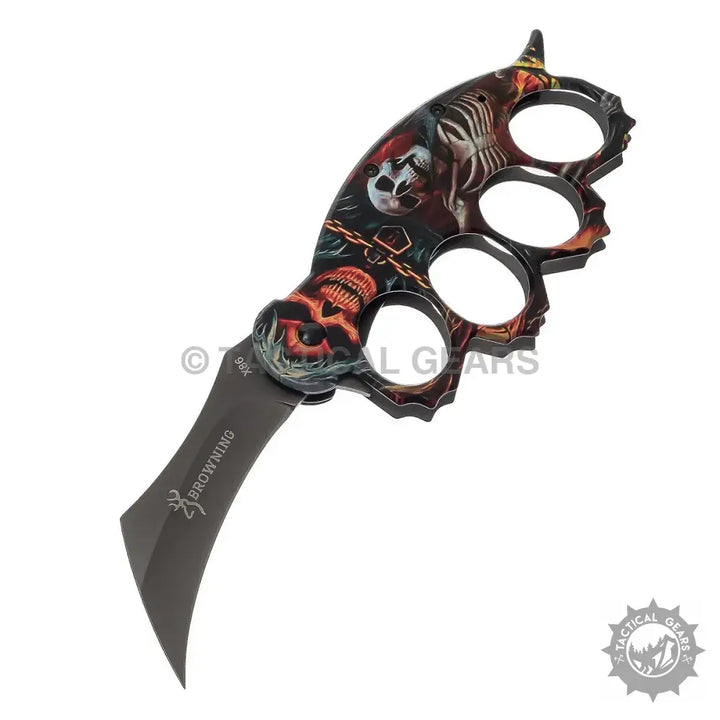Browning x86 travel knife with black red skull theme and brass knuckles handle