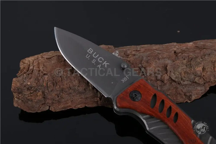 Buck USA X61 Tactical Pocket Survival Knife with gray blade and orange gray handle