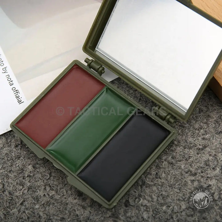 Open Camo Face Paint with Mirror showing red-brown, dark green, and black colors