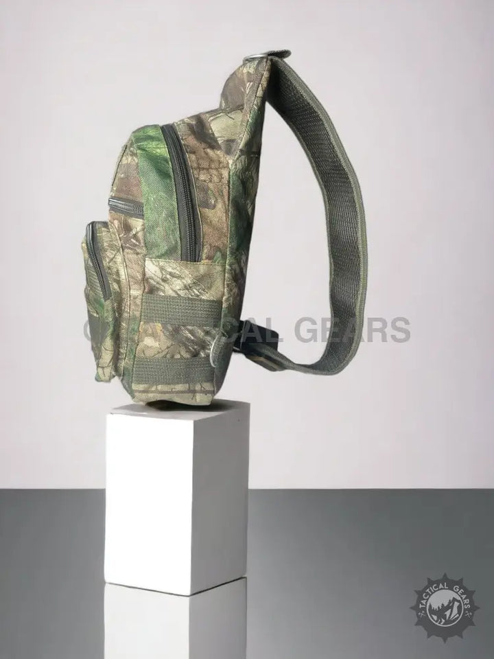 Camo Hunting Sling Bag with multiple zippers and padded shoulder strap for hunting