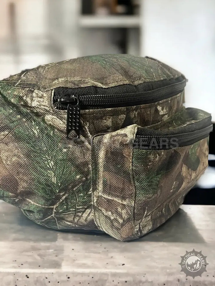 Camouflage hunting waist fanny pack with multiple zippered compartments for outdoor use