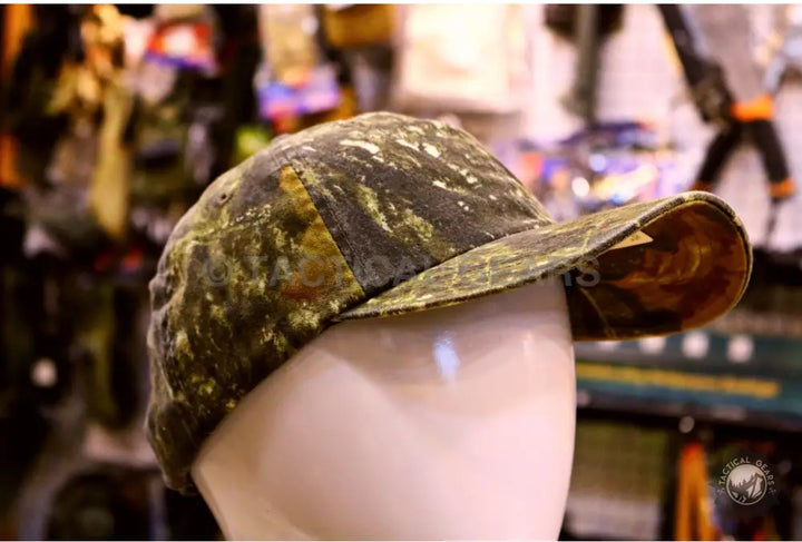 Tactical Camo Cap on mannequin head showcasing stylish camouflage baseball cap with customer support
