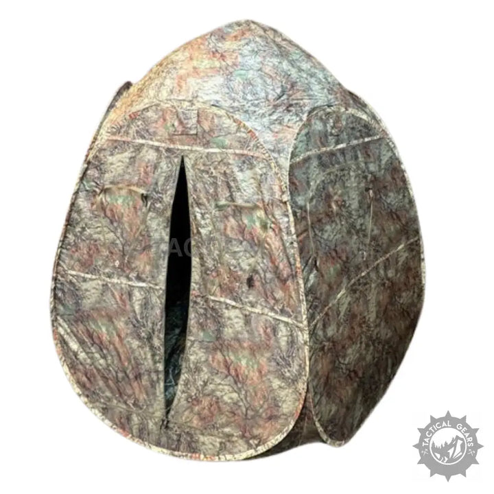 Camouflage hunting tent with pop-up design and zippered entrance for hunting concealment