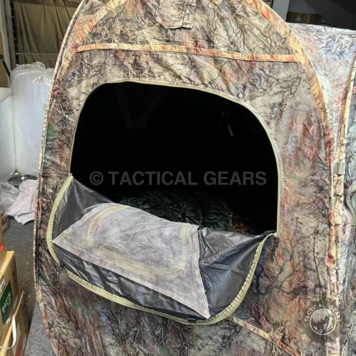 Camouflage hunting tent with a large open window for effective hunting concealment