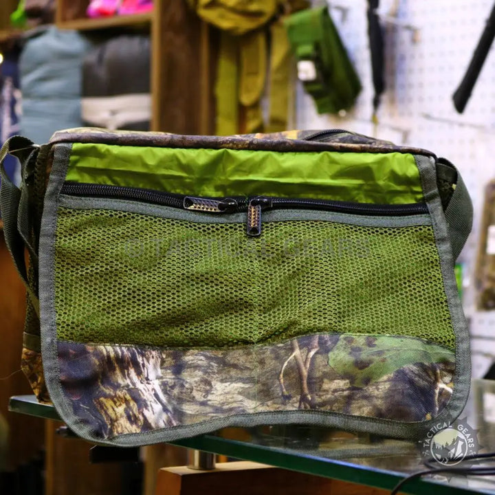 Green camouflage tactical shoulder bag with mesh pockets from Camouflage Mega Duffle collection