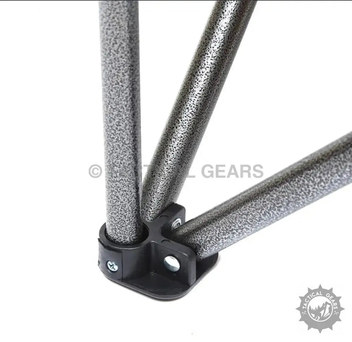 Black plastic joint connecting three speckled grey metal poles for Camp Master Folding Chair