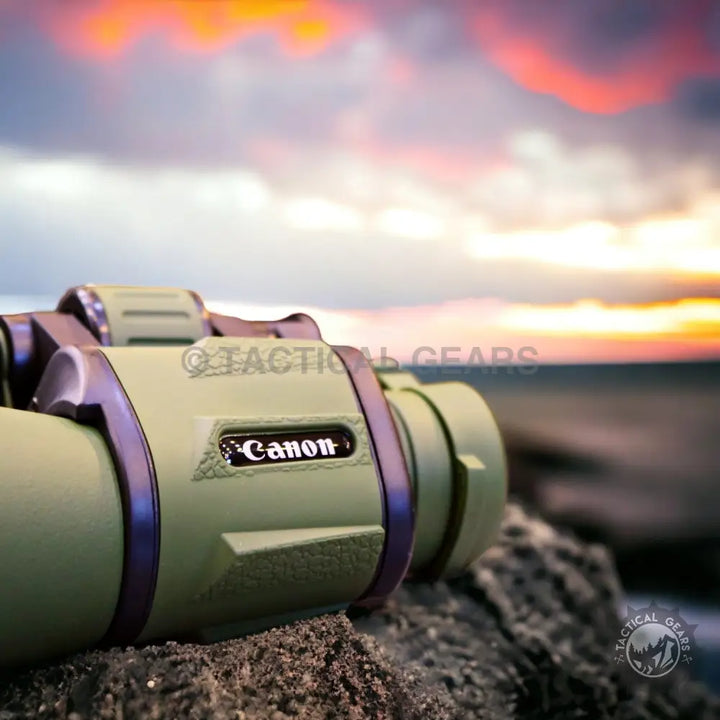Olive green Canon 20x50 binoculars with purple accents for clear outdoor viewing