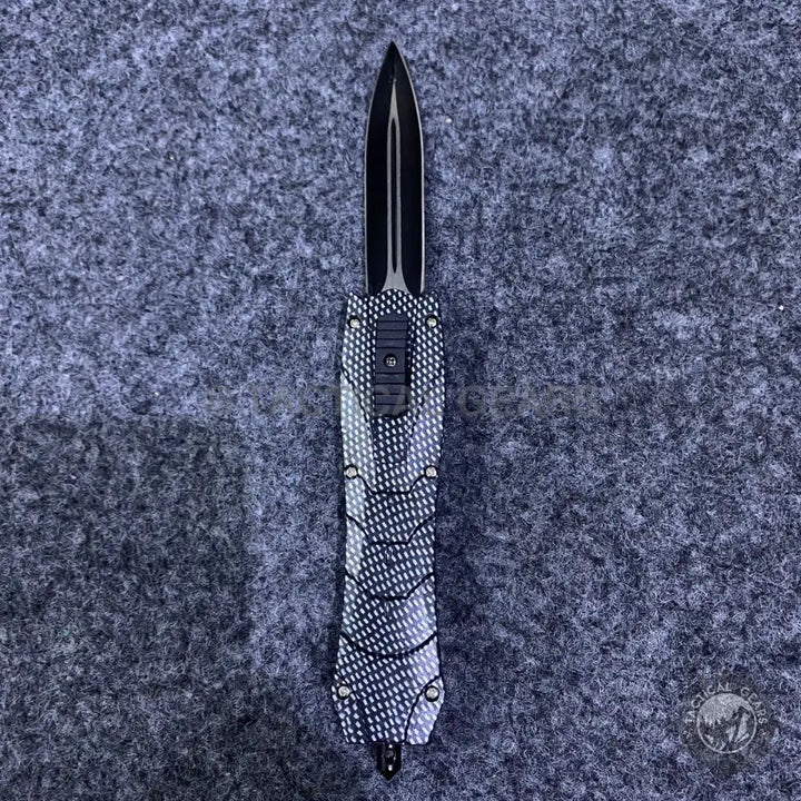 Black and white patterned automatic folding knife from Combat OTF Knives collection