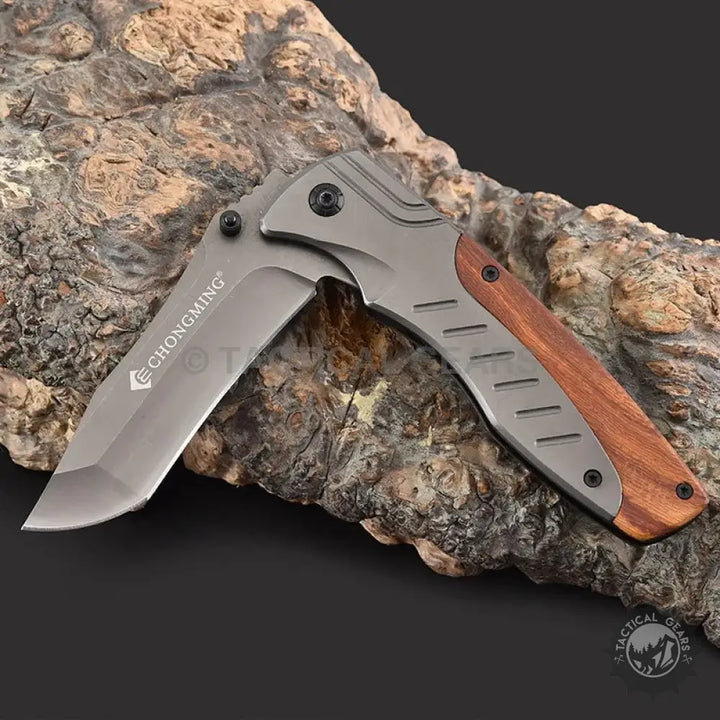 Silver-bladed folding knife with Chongming wood handle for handle pocket knife use