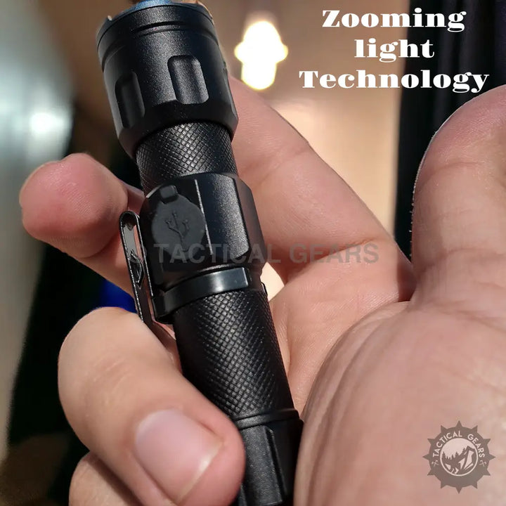 Black metal COBAMini Rechargeable LED Flashlight with textured grip and pocket clip