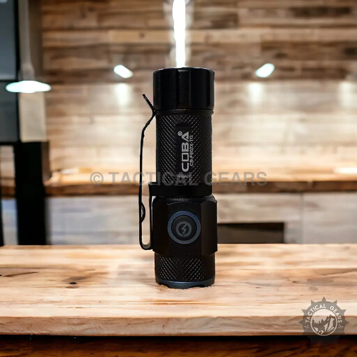 Black COBA Pocket Rechargeable LED Flashlight with belt clip and charging indicator